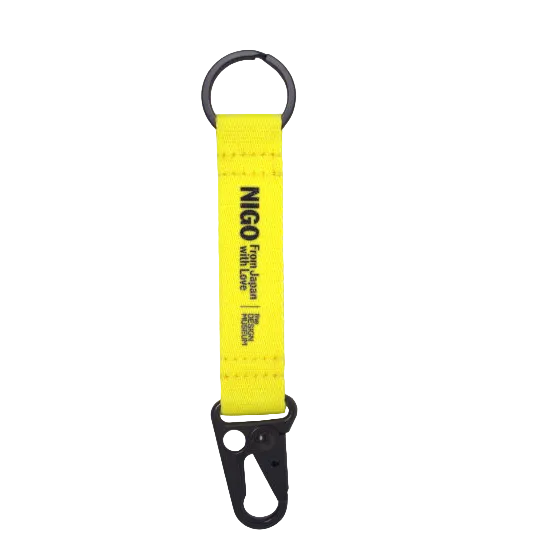 Yellow lanyard with black carabiner on a white background