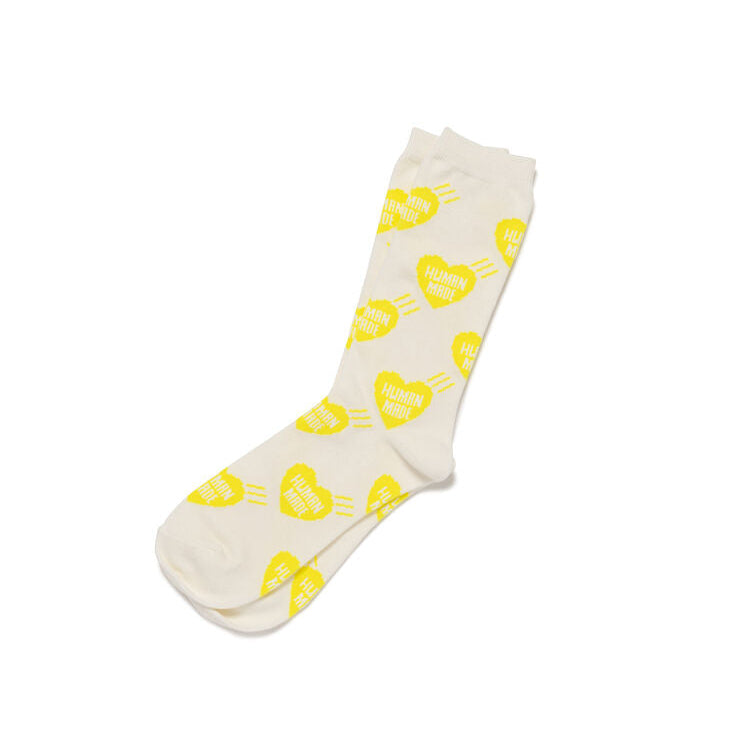 White sock with yellow heart patterns on a white background
