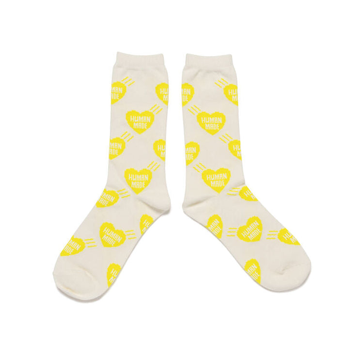 White socks with yellow heart patterns on a white background