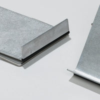 Two metal bookstands shown on a clean light gray background.