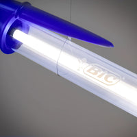Closeup of a Blue BIC pen lamp showing the BIC logo against a grey background. 