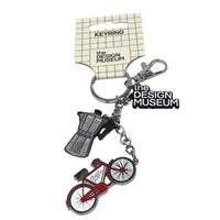 Keychain with bicycle design and 'The Design Museum' branding on a white background