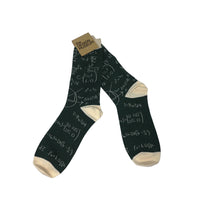 Dark green socks with mathematical equations on a white background
