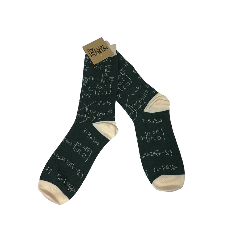 Dark green socks with mathematical equations on a white background
