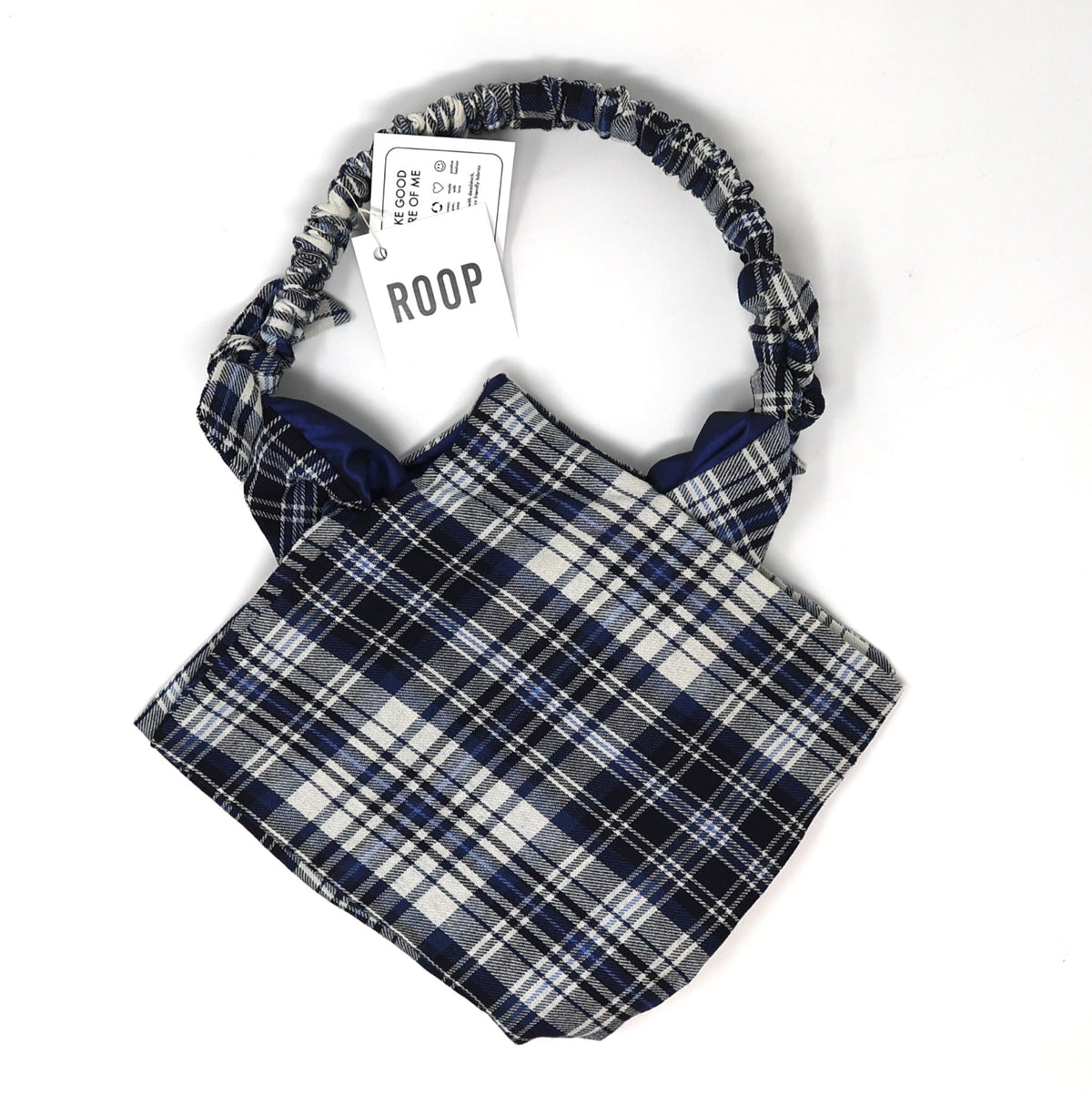 Blue and white plaid handbag on a white background