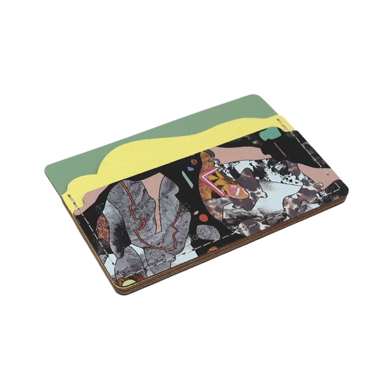 Colorful abstract marbled design on a rectangular card holder with a green and yellow border