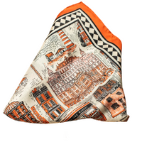 Scarf with architectural illustrations and orange border on a white background