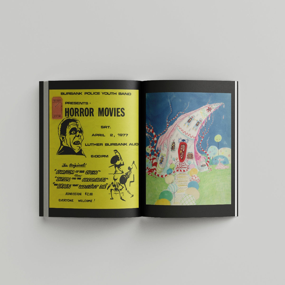 Open page of Tim Burton 'Designing Worlds' catalogue featuring a yellow flyer on the left and a colorful illustration on the right.