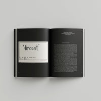 Open page of Tim Burton 'Designing Worlds' catalogue featuring a hand written note that says 'vincent' on the right and a black page with white text on the left.