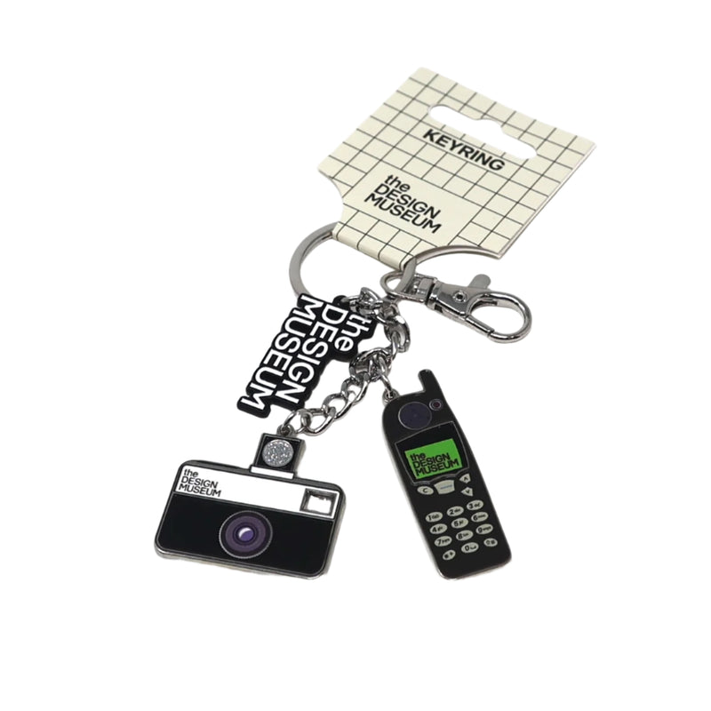 Keychain with camera and phone charm on a white background