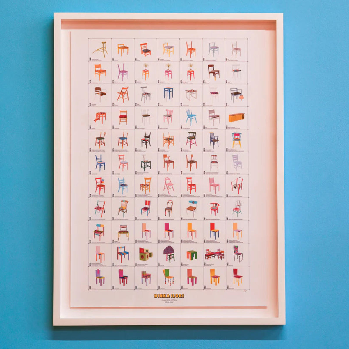 Framed poster with colourful illustrations of chairs on a blue background