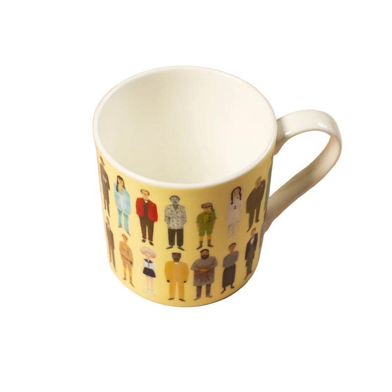Yellow mug with a pattern of illustrated people on a white background