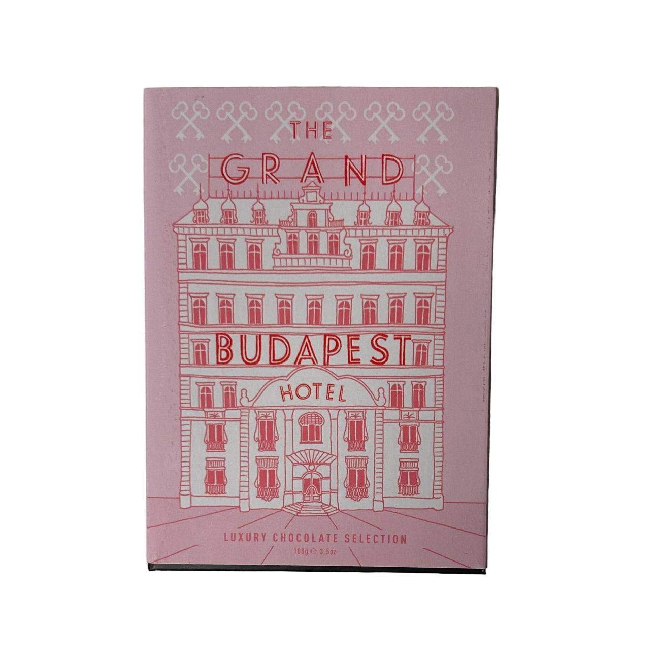 Chocolate box with 'The Grand Budapest Hotel' design on a white background