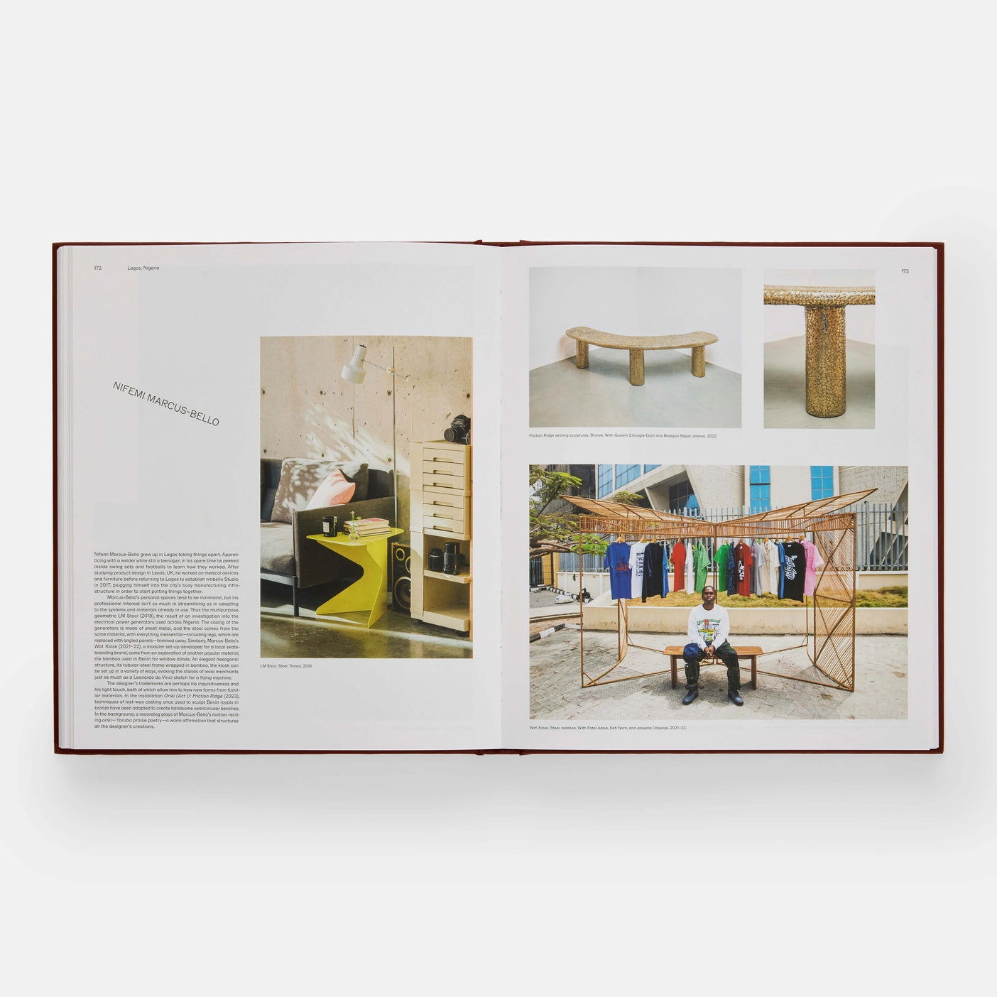 Open page of Designed for Life by Phaidon featuring a photograph of a person sitting on a wooden bench with rails of t-shirts hanging above.