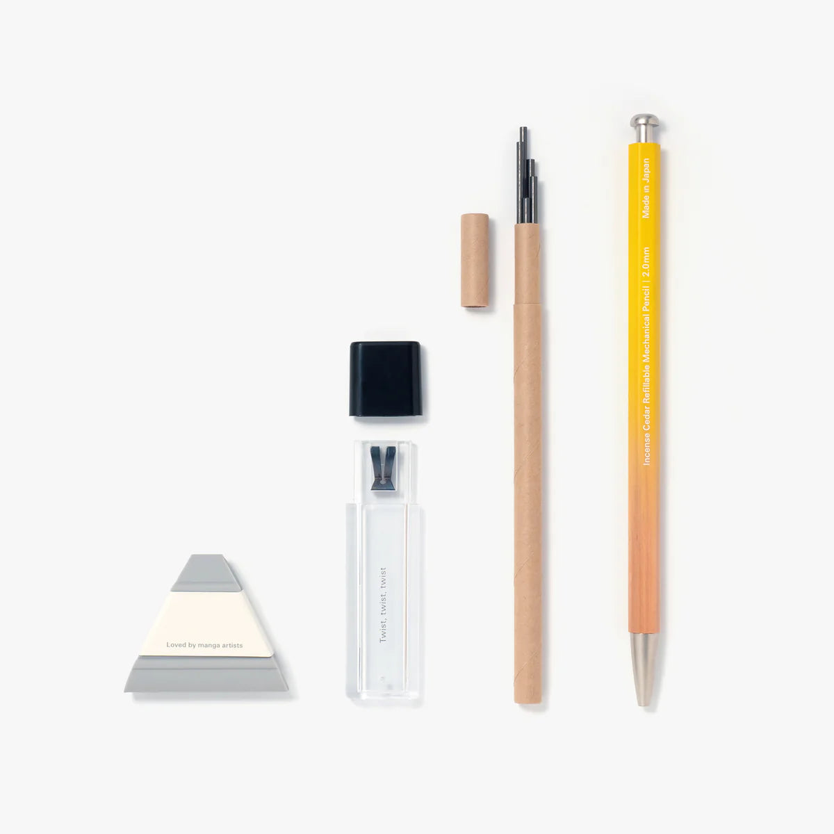 An orange mechanical pencil with extra lead and a lead pointer for sharpening.
