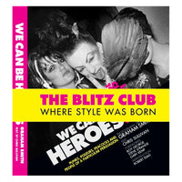 Cover of the book 'We Can Be Heroes' featuring black and white photograph of two individuals with a yellow banner overlay reading 'THE BLITZ CLUB WHERE STYLE WAS BORN', with additional text and logos.