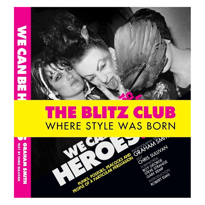 Cover of the book 'We Can Be Heroes' featuring black and white photograph of two individuals with a yellow banner overlay reading 'THE BLITZ CLUB WHERE STYLE WAS BORN', with additional text and logos.