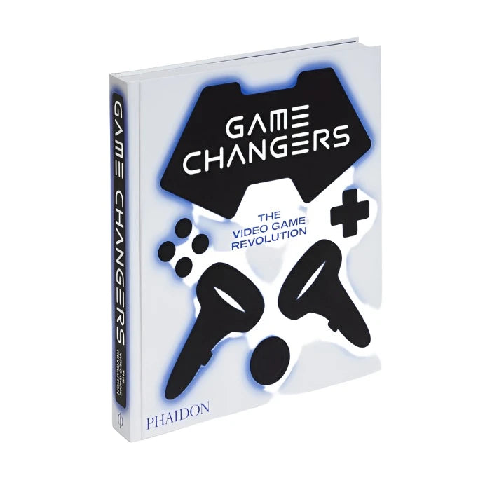 The cover of the book 'Game Changers: The Video Game Revolution' on an angle, featureing black silhouettes of a game controller with blue accents on a white background.