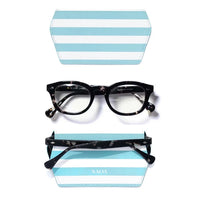 Black tortoiseshell round-frame eyeglasses shown with a matching light blue and white striped case, with a second case view above and the glasses resting on the lower case below. 