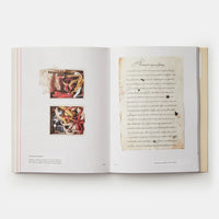 Open book with text and images on a white background