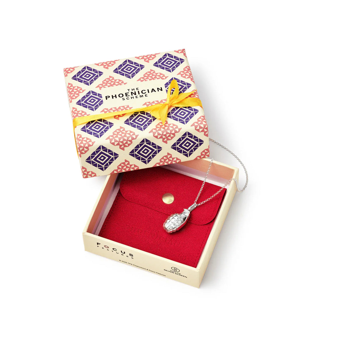Silver grenade necklace in a jewelry box with a decorative blue and pink box on a white background