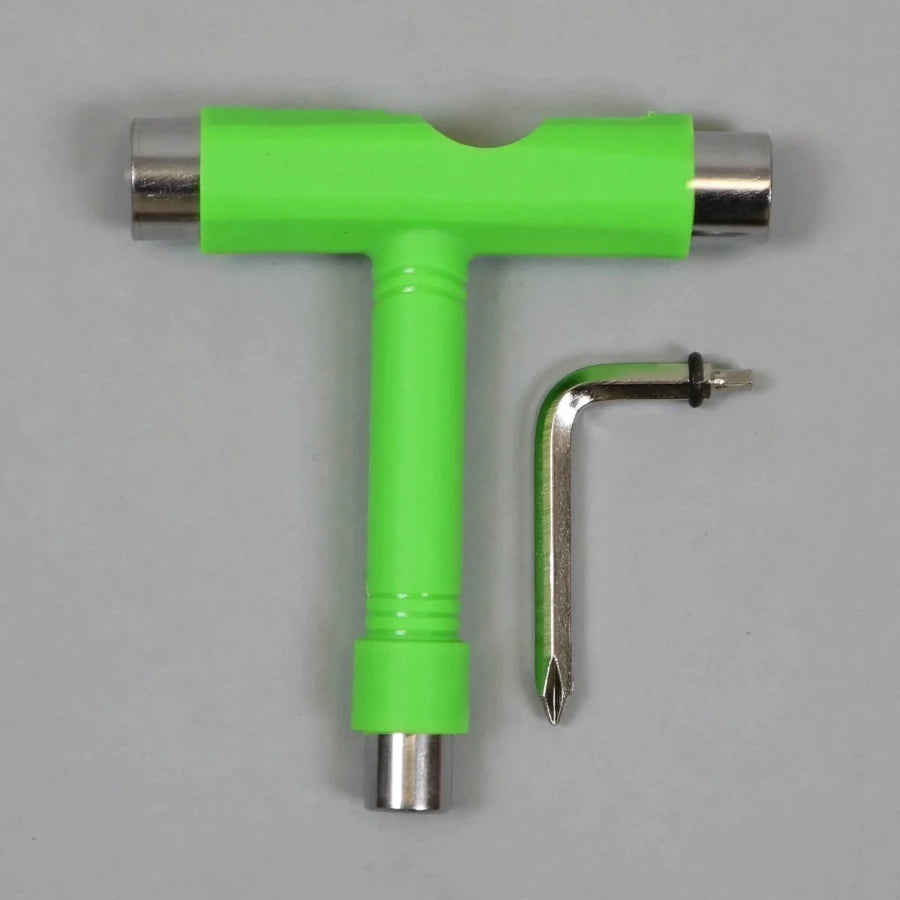 Green tool with screw on a grey background
