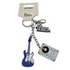 Keychain with guitar and cassette charm on a white background, featuring 'The Design Museum' branding.