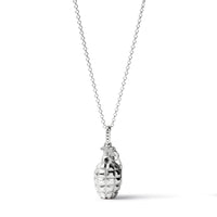 Silver grenade-shaped pendant on a chain against a white background