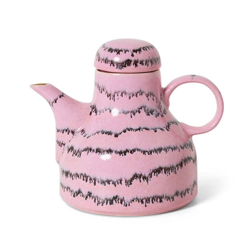 A pink and black abstract ceramic coffee pot on a white background.
