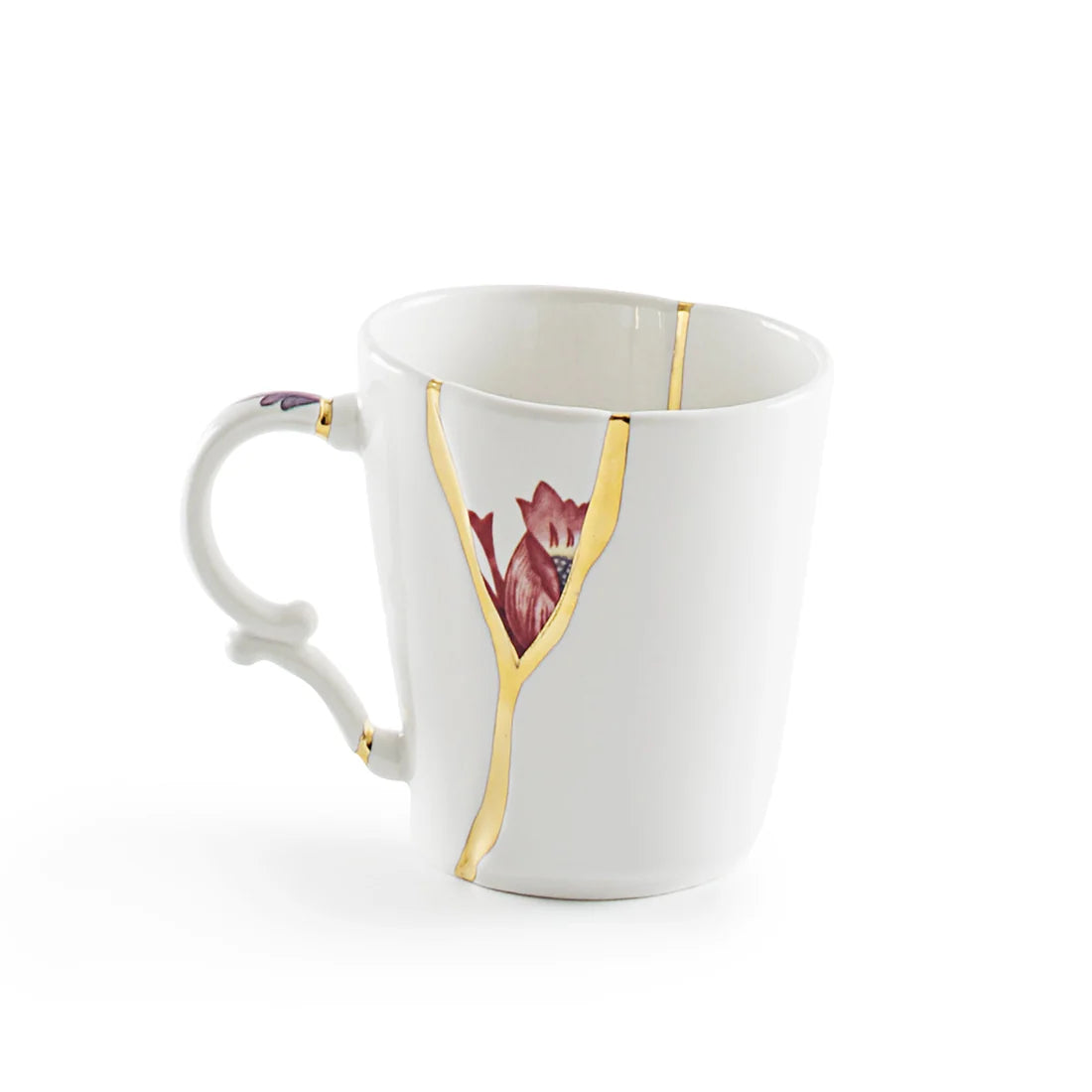 White ceramic mug with floral design and gold kintsugi accents on a white background