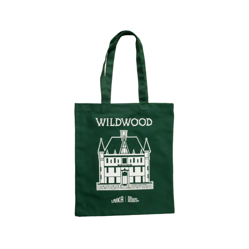 Green wildwood tote bag with white illustration of a house.