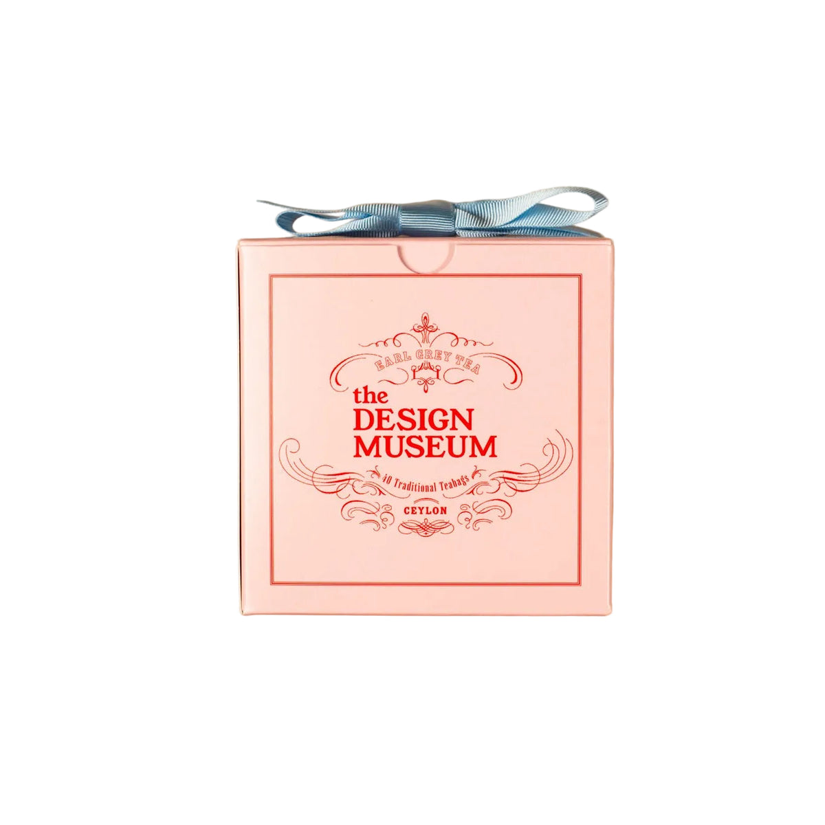 Pink Mendl's teabags box with a blue ribbon and 'The Design Museum' branding on a white background