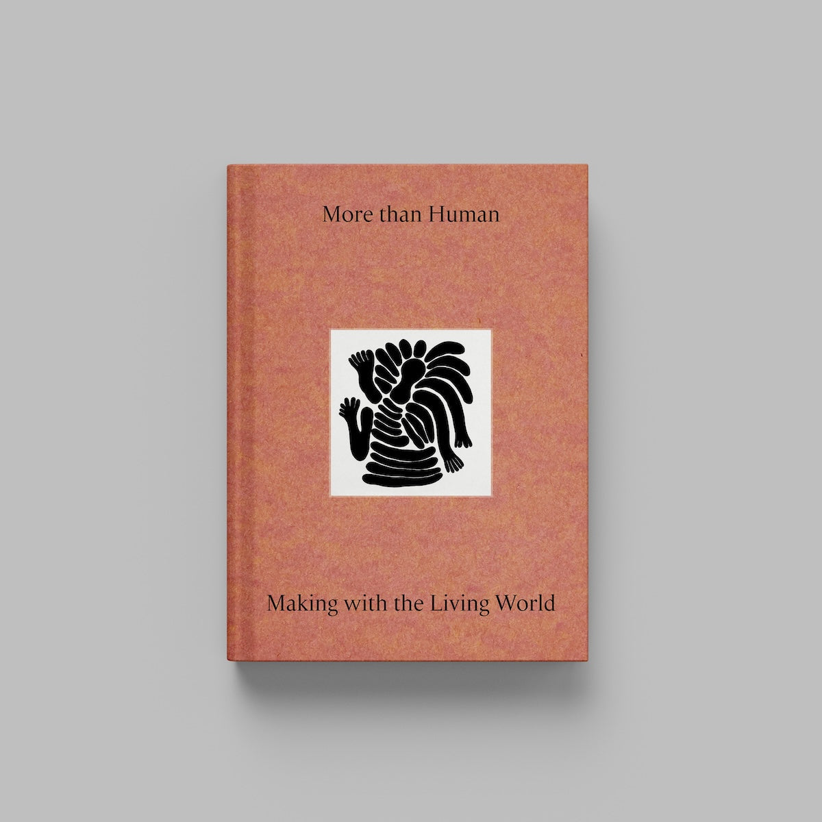 Book titled 'More than Human: Making with the Living World' with a light red cover and a black illustration in the centre.