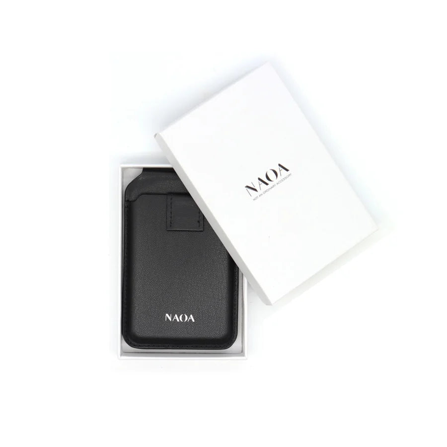 A black wallet with a small strap detail, shown in its white box next to its white lid, both featuring the NAOA logo.