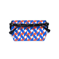 A glasses case with a blue, orange, and white geometric triangle pattern with black glasses inside on a white background.