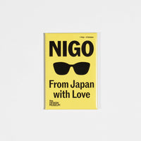 Yellow magnet with 'NIGO' and 'From Japan with Love' text on a white background