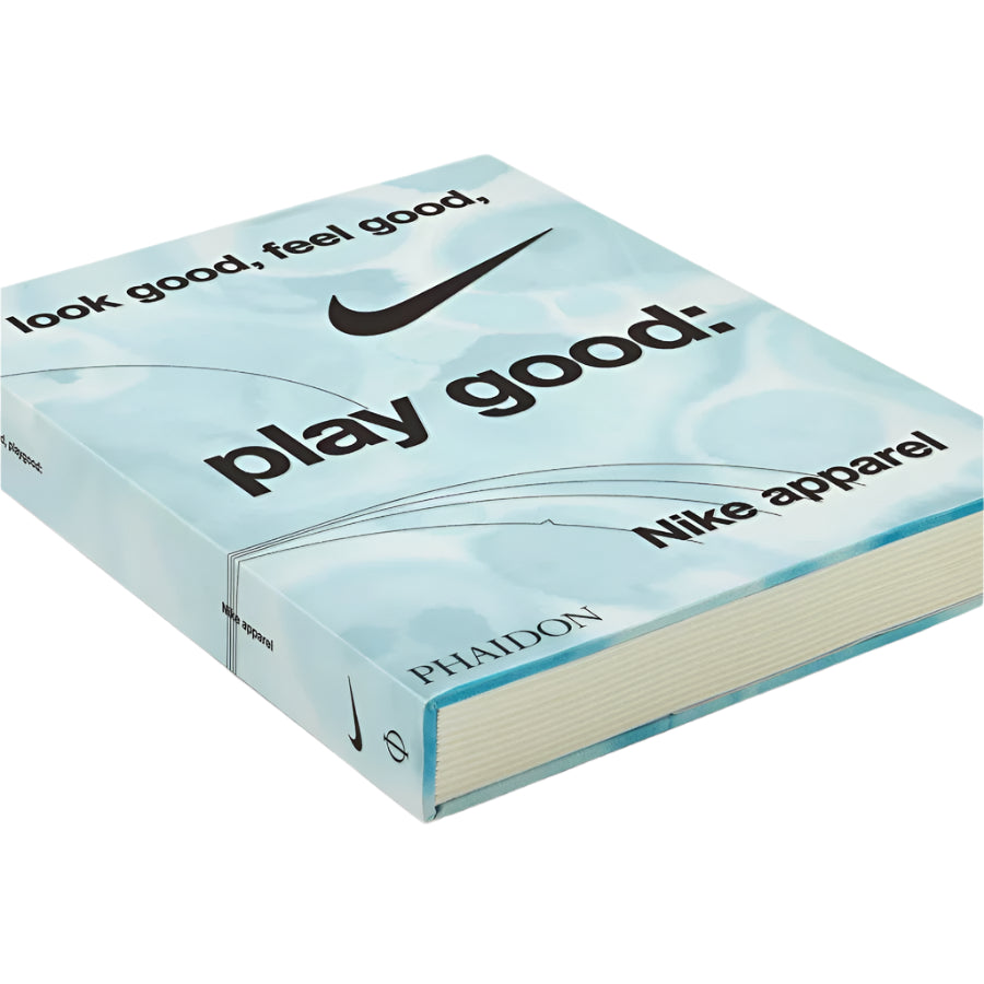 Side view of Nike Apparel book featuring a front cover with a blue water-stained design