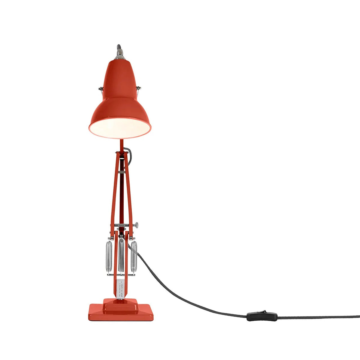 Red lamp with a white shade on a white background
