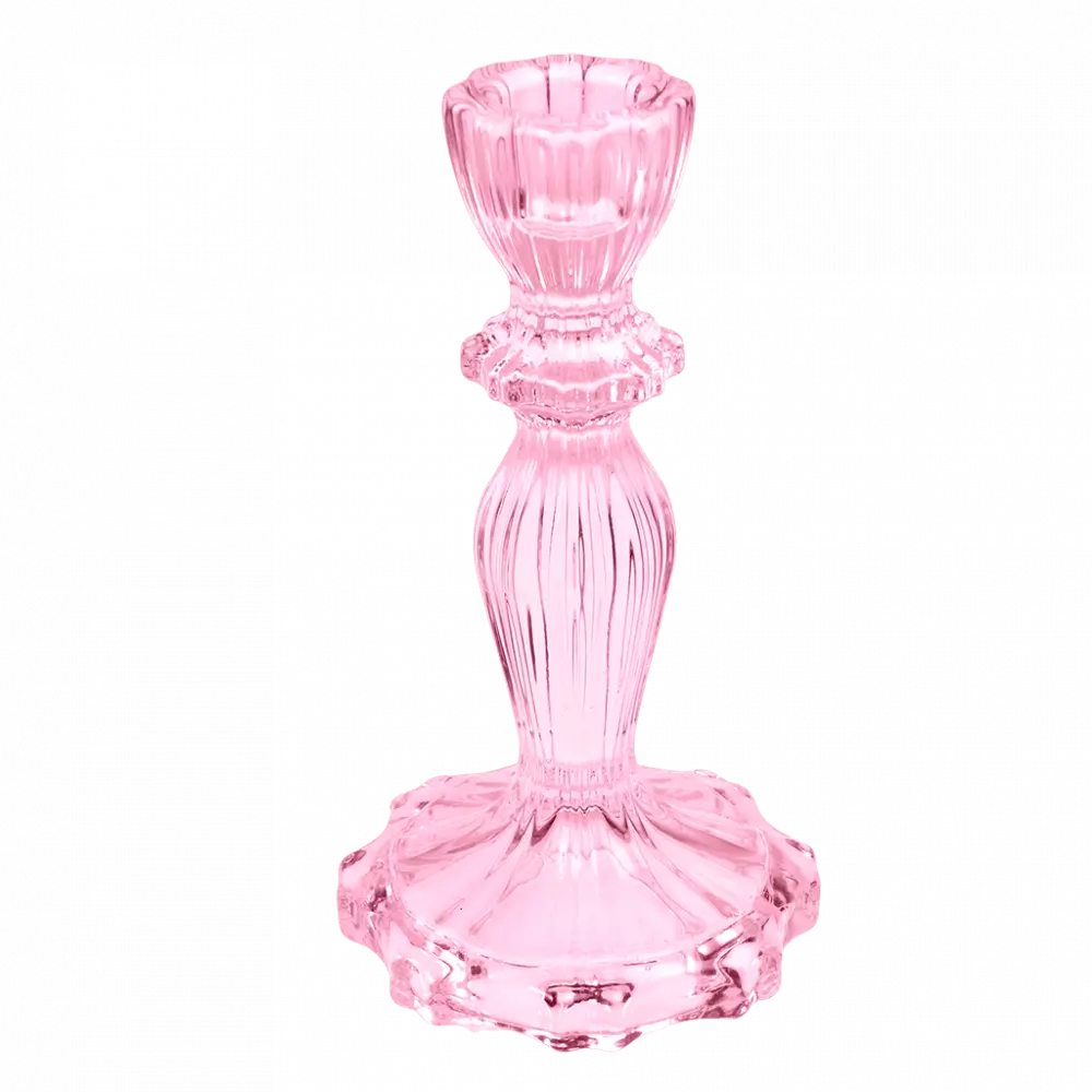 pink glass candle holder on plain background