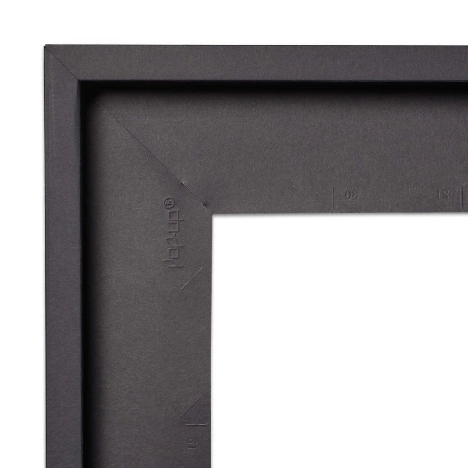 Corner of a black picture frame against a white background