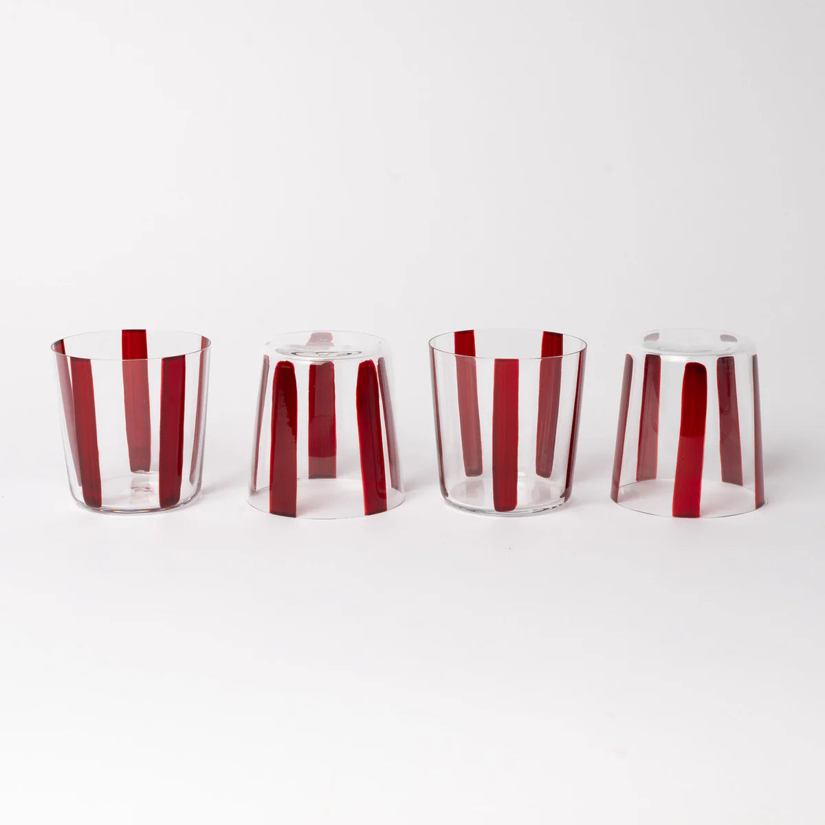 Conran Shop set of four real Christal thin transparent tumbler glass cup with some hand painted burgundy stripes, picture of them up and down on white background

