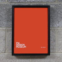 A black stained ash picture frame with a 30 x 40cm Perspex cover, displayed against a concrete background.