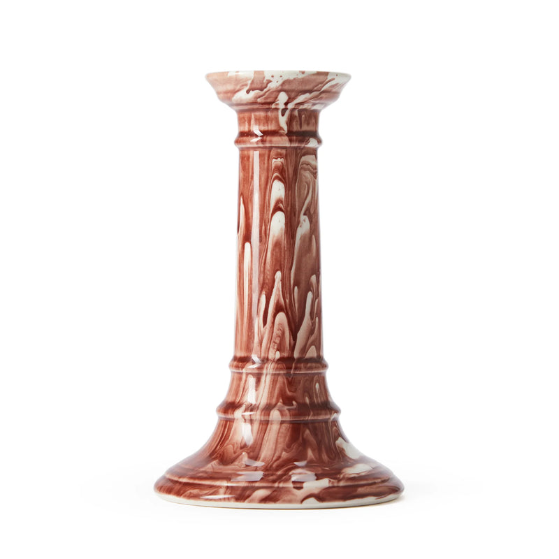 A red and white Marble-patterned candle holder on a white background