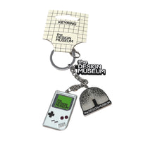 Keychain with two charms featuring 'The Design Museum' logo on a white background