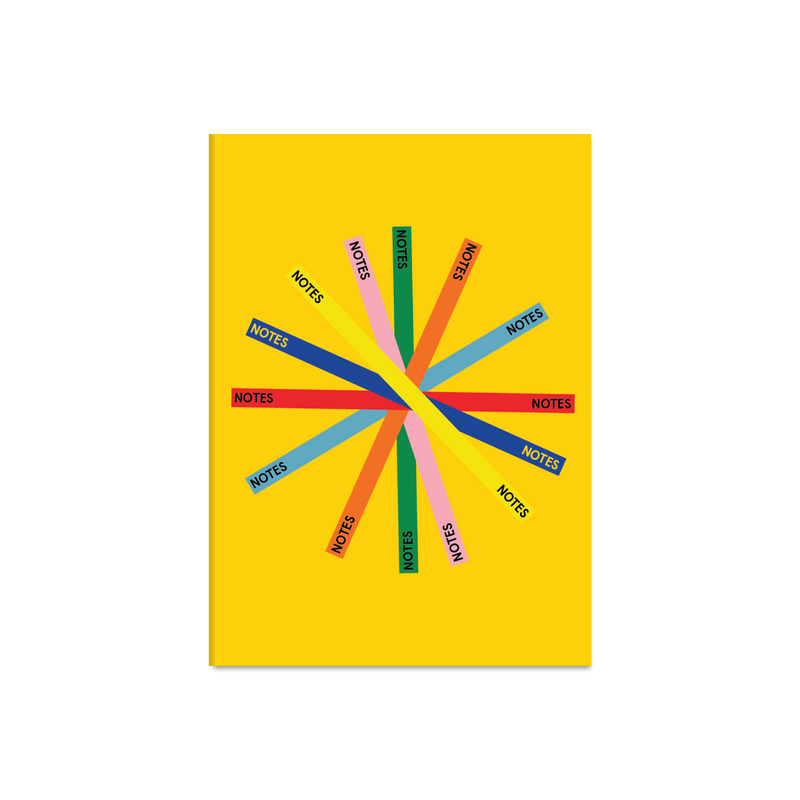 A yellow notebook with a colourful abstract star design on the front.