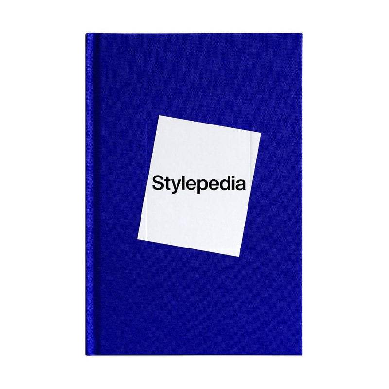 The front cover of 'Stylepedia' featuring the title inside a white tilted square against a dark blue background. 