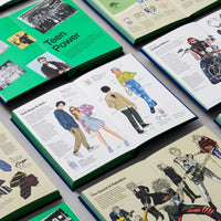 Several copies of Stylepedia open on different pages showing illustrations of different eras of fashion.