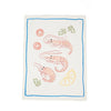 Tea towel with shrimp and lemon design on a white background