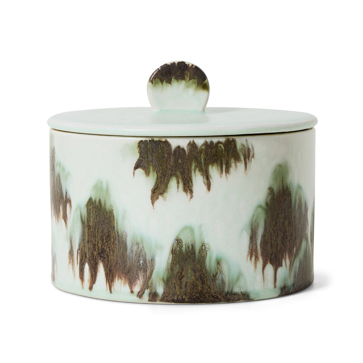 A green and black abstract ceramic storage jar on a white background
