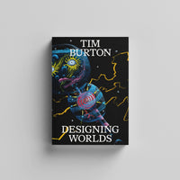 The front cover of 'Designing Worlds' catalogue by Tim Burton featuring a colourful absract illustration of an alien on a black background.